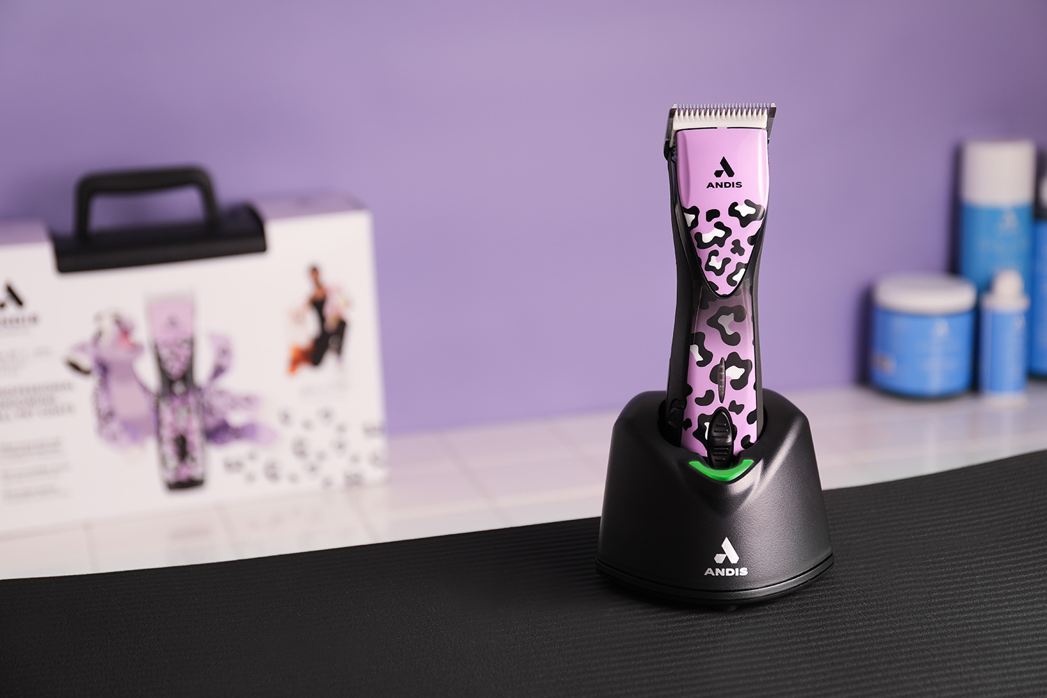 Purple spotted Andis Pulse ZR II upright in charging stand